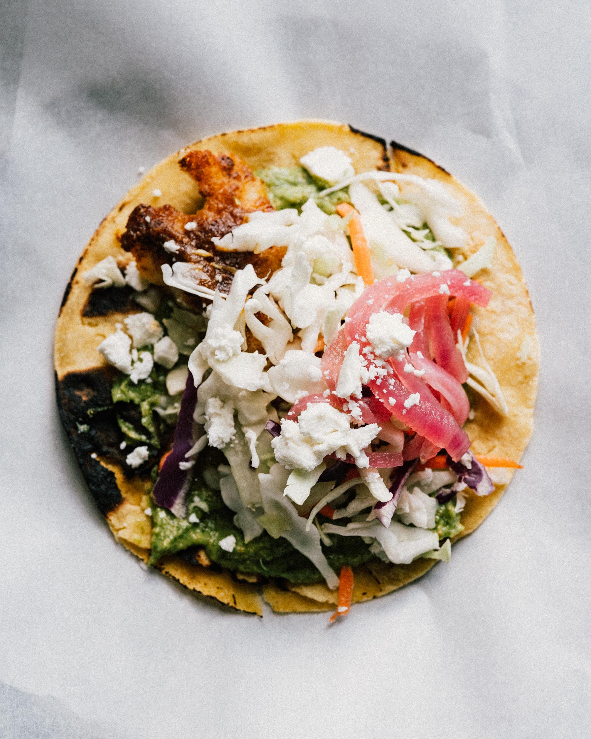 Blackened Cod Tacos w/ Avocado Pepita Sauce